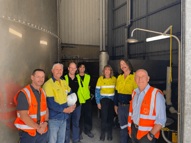 Qtech Australia team with a Sydney Water representative at an industrial wastewater treatment site.
